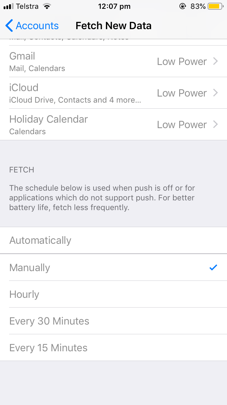 Screenshot of iPhone email account settings page showing 'fetch' schedule set to 'Manually'