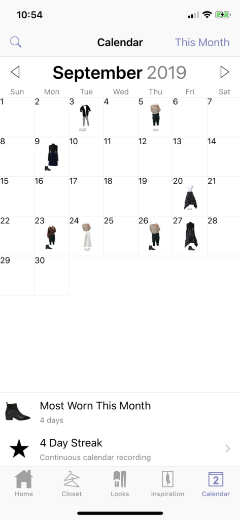 Screenshot of the Stylebook wardrobe app, showing a calendar grid for September with photos of clothing laid out on a few of the days. Icons at the bottom include home, closer, looks, inspiration and calendar.